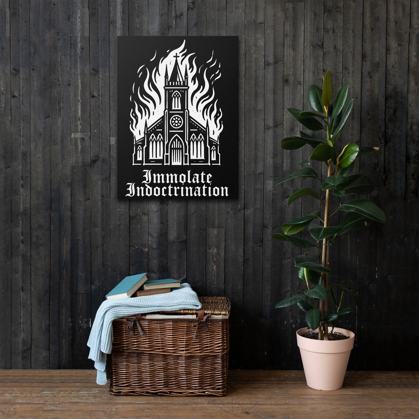white design on black
an illustrated burning church withthe words immolate indoctrination in older goth font below on a canvas wall art print